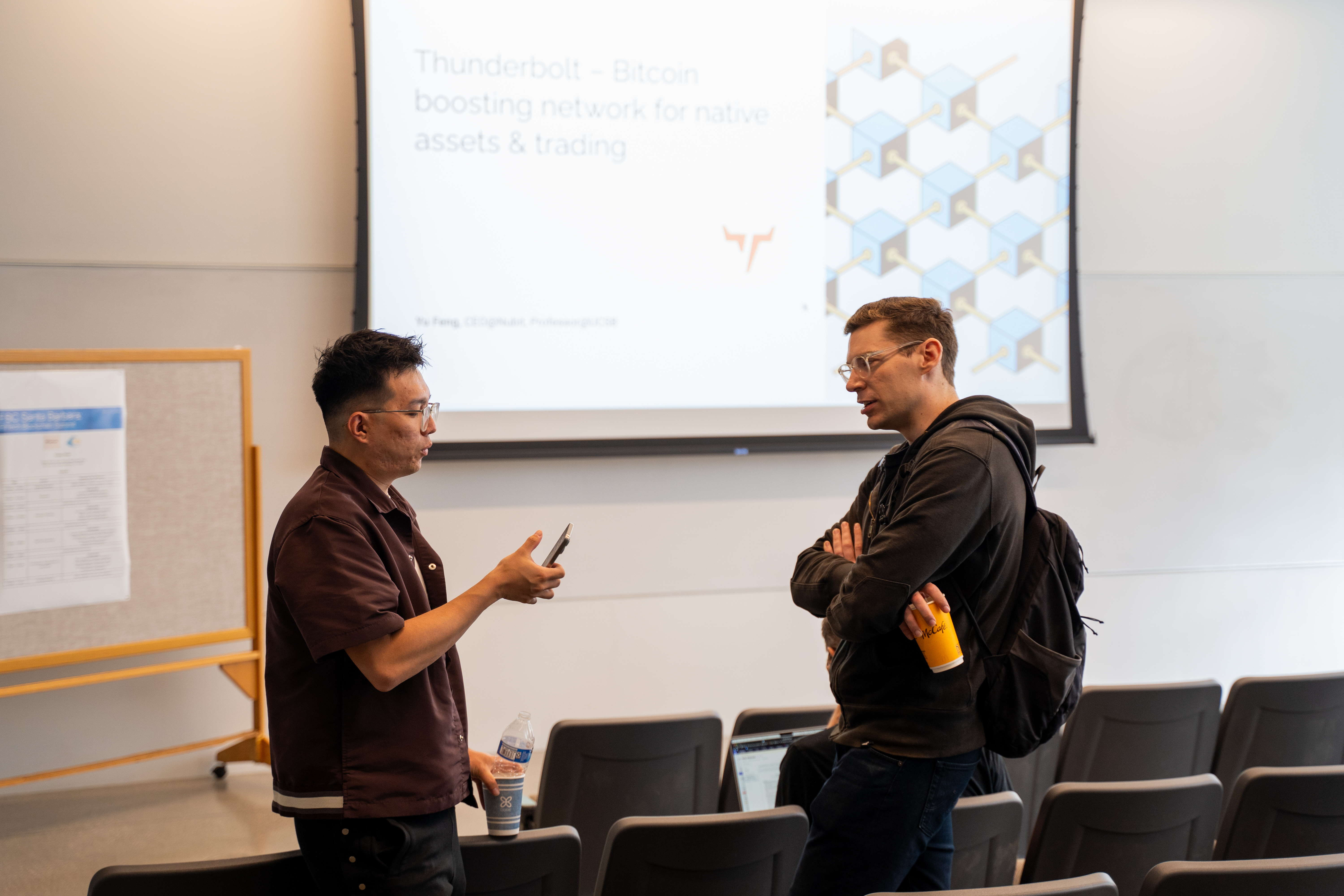 Attendees conversing