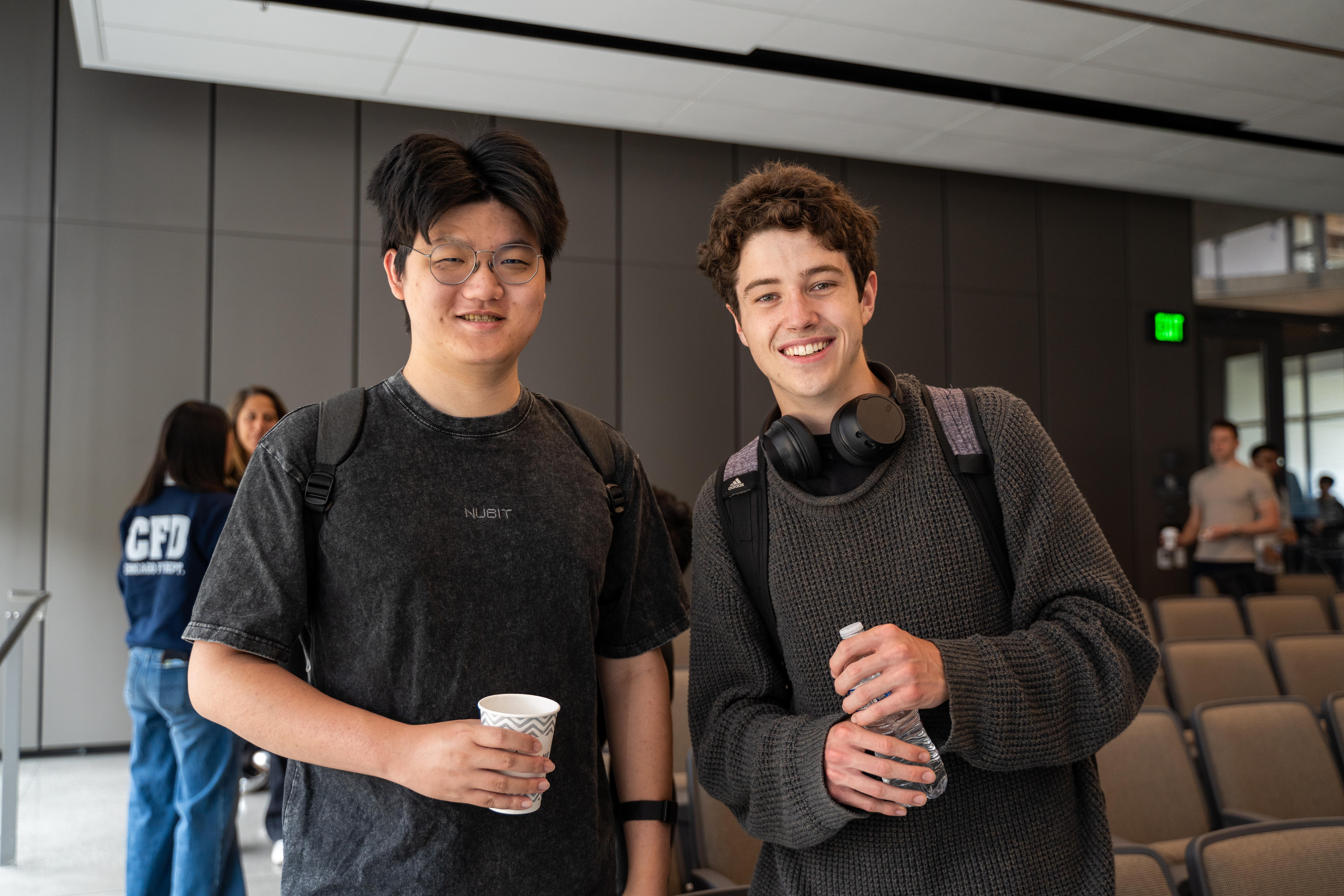 Two men looking at the camera